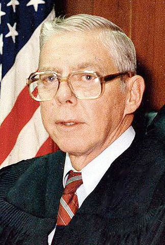 Rousseau, Jr., The Honorable Julius A.